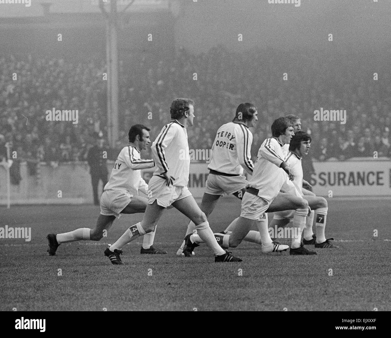 FA Cup Quarter Final match at Elland Road. Leeds United 2 v Tottenham Hotspur 1. The Leeds team warm up before kick off. 18th March 1972.  *** Local Caption *** Billy Bremner Terry Cooper Stock Photo