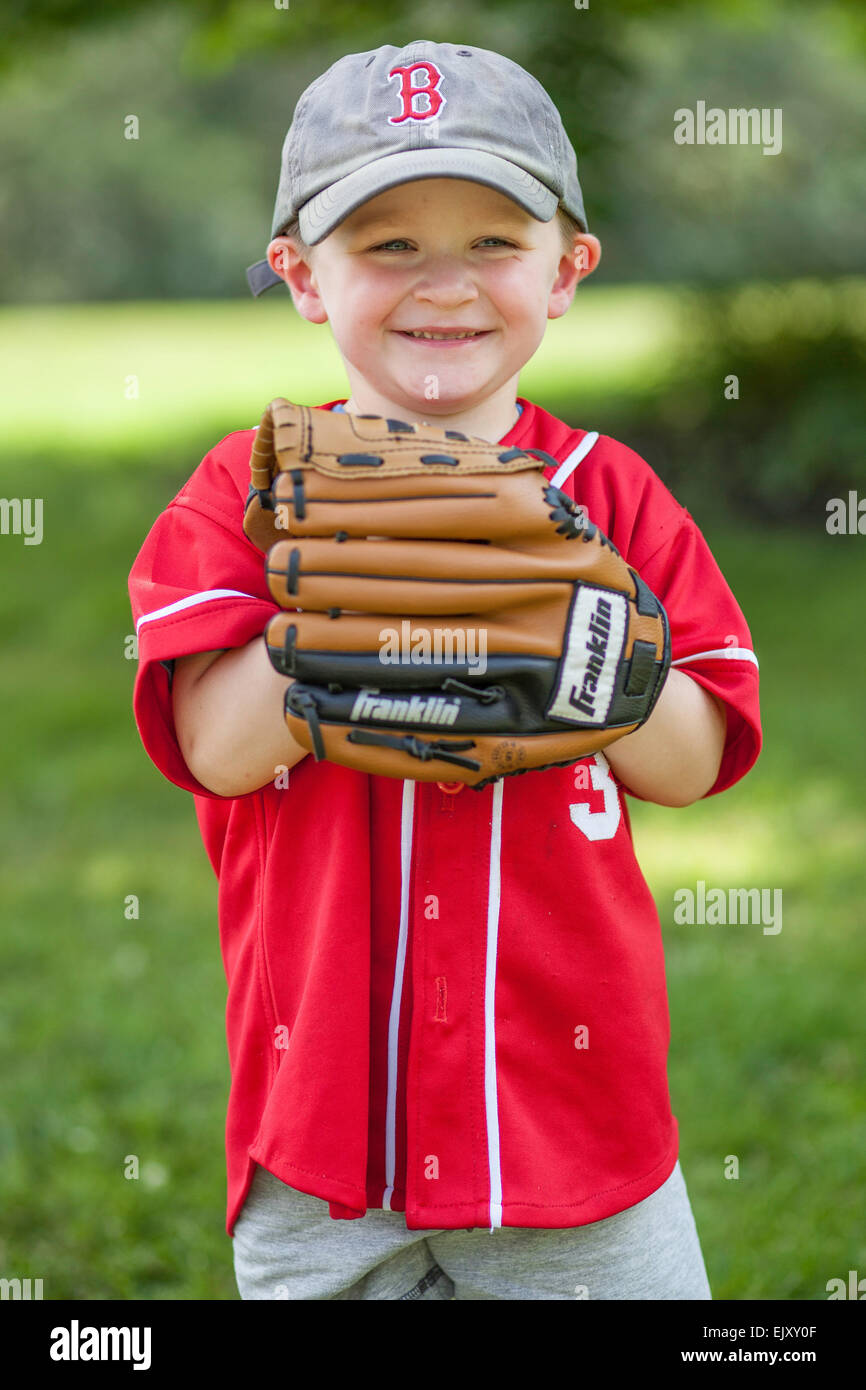 Boy with large baseball glove Stock Photo Alamy