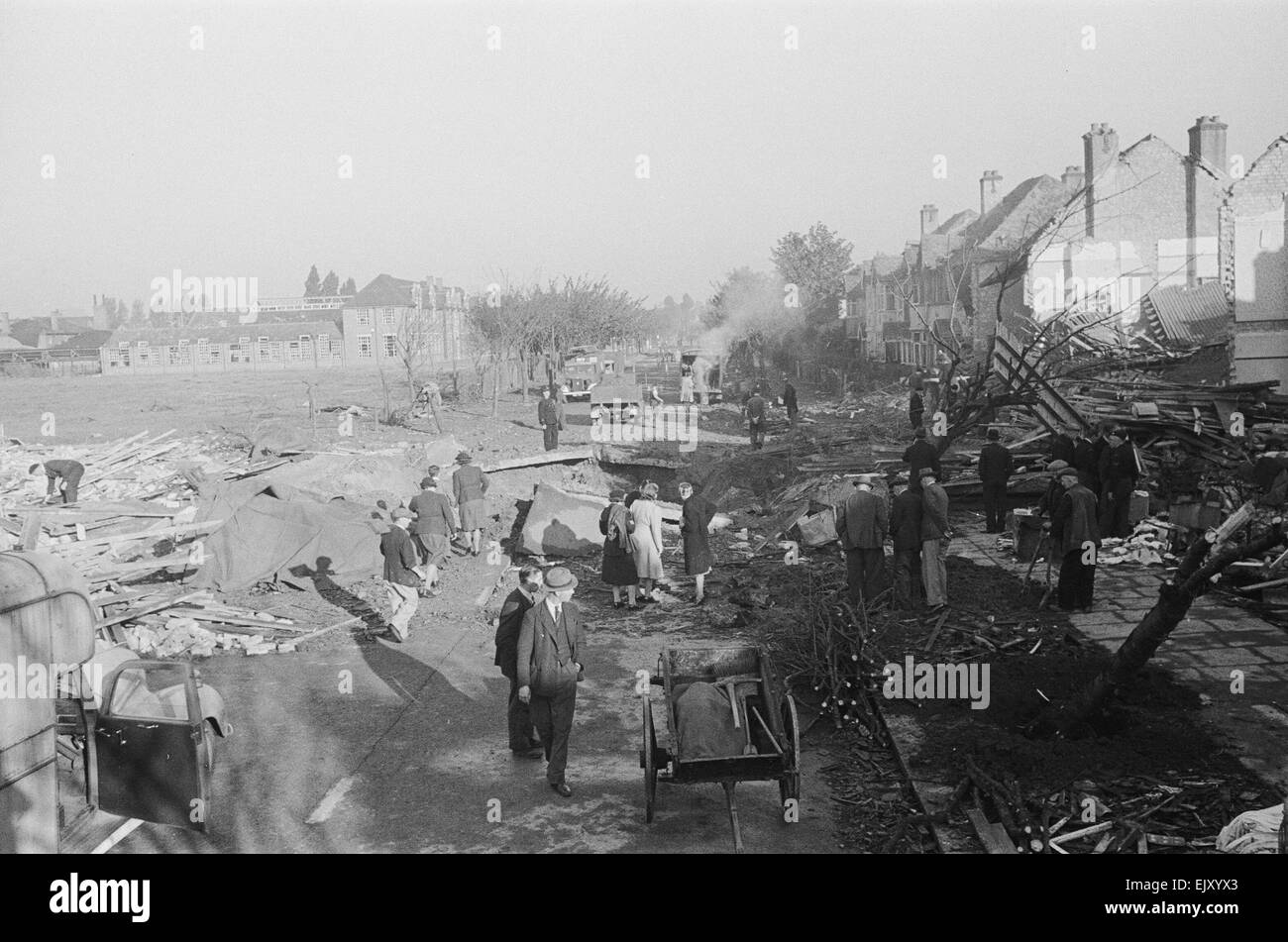 The aftermath of  V2 explosion. On the 8th September 1944 a huge explosion occured in Staveley Road, Chiswick, West London. There had been no siren, no warning and no V1 flying bombs had been sighted.  The explosion was caused by the first V2 ballistic missile fired in anger. Hitler's much vaunted A4 Rocket more commonly known as the V2 weighed 13 tons and had arrived via the stratosphere at 3,000 miles an hour faster than the speed of sound. This meant that the first anybody knew about the attack was the explosion followed by the roar of the rocket motors catching up Stock Photo
