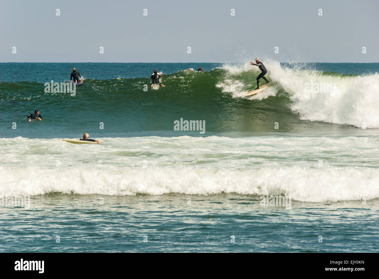 Senior surfer riding a large, clean swell at Surfrider Beach in Malibu, California, USA. Stock Photo