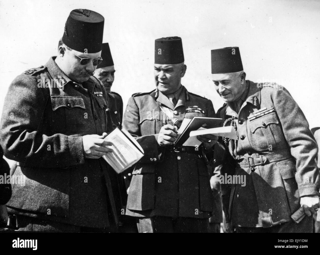 KING FAROUK OF EGYPT (1920-1965)  at left watching Army manouvres about 1947 Stock Photo