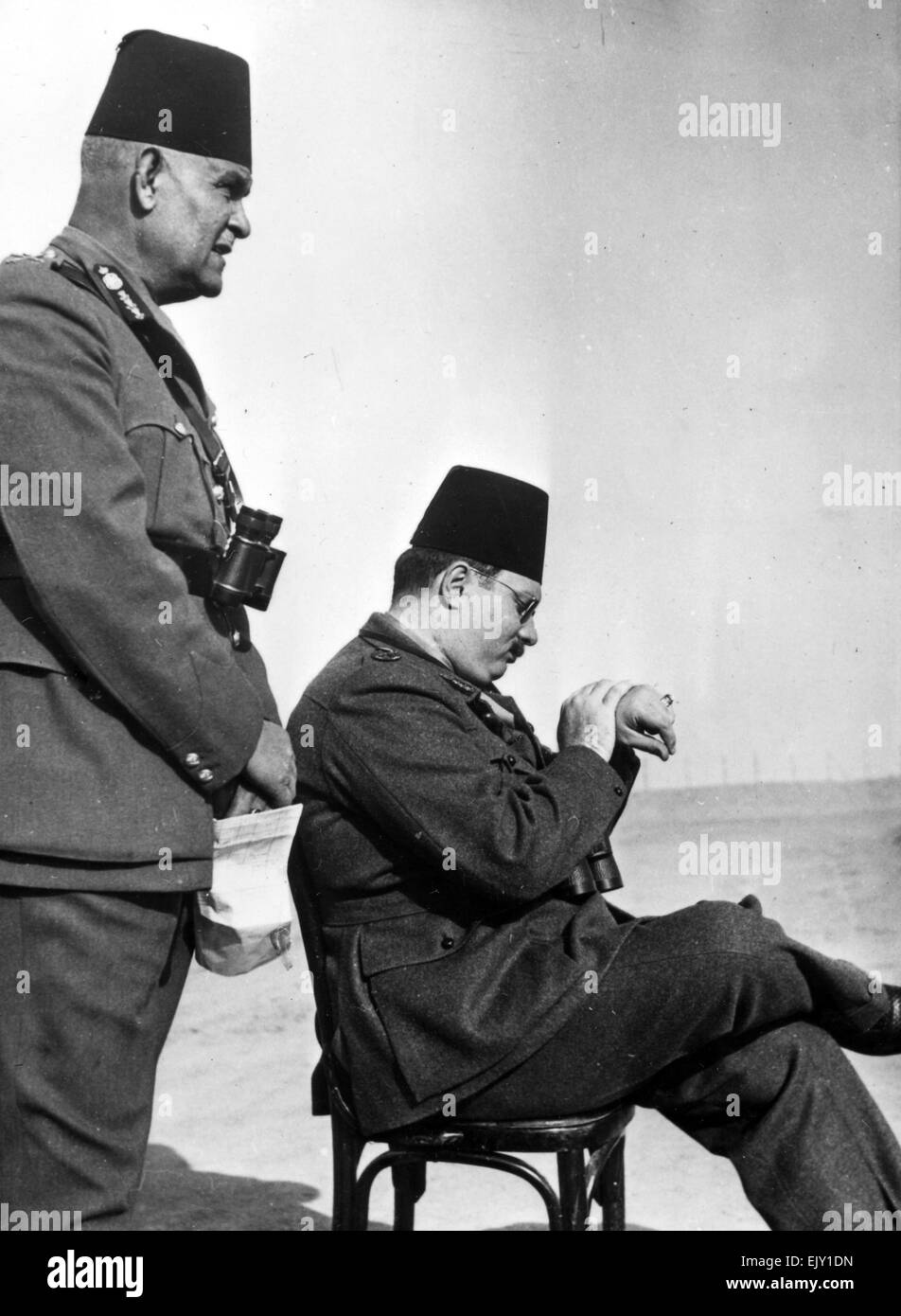 KING FAROUK OF EGYPT (1920-1965)  watching Army manouvres about 1947 Stock Photo