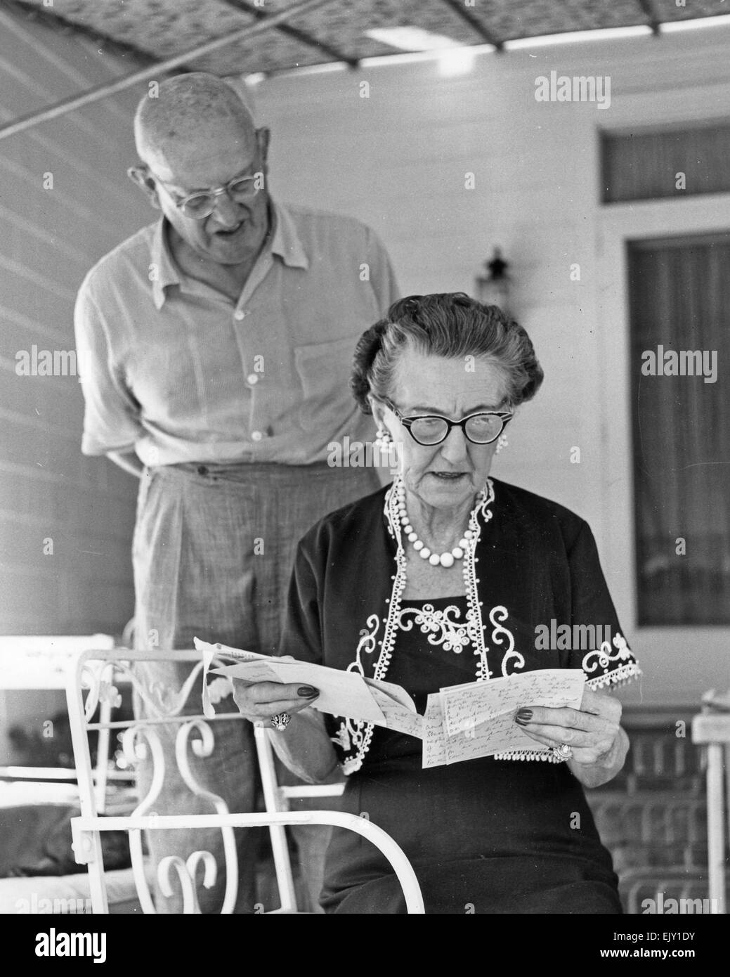 P.G.WODEHOUSE (1881-1975) English humourist with his wife Ethel at their house in Basket Neck Lane, Remsenburg, New York, about 1956. Photo Graphic House 6640J Stock Photo