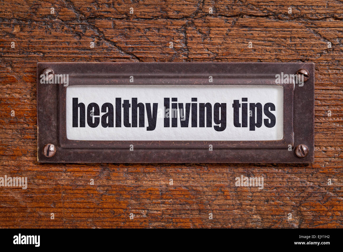healthy living tips - file cabinet label, bronze holder against grunge ...