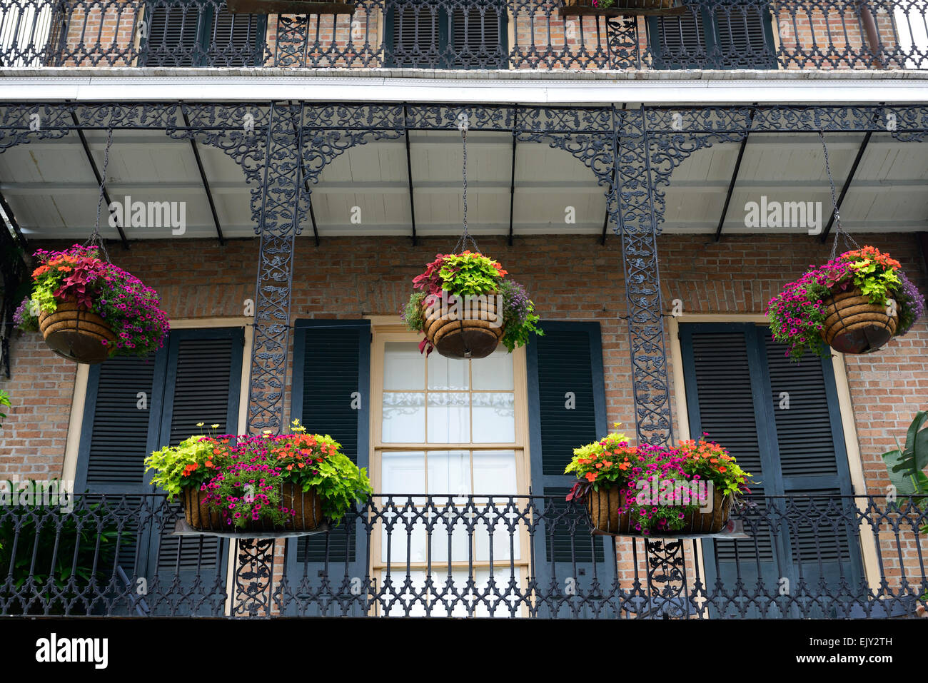 https://c8.alamy.com/comp/EJY2TH/hanging-baskets-planters-balcony-balconies-decorate-french-quarter-EJY2TH.jpg