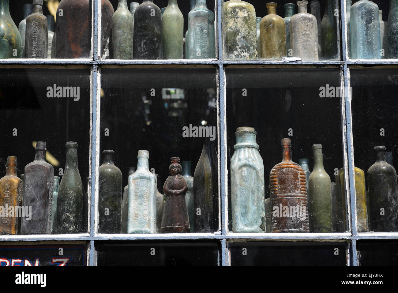 Hex Old World Witchery window display old antique bottles rue decatur french voodoo quarter new orleans louisiana RM USA Stock Photo
