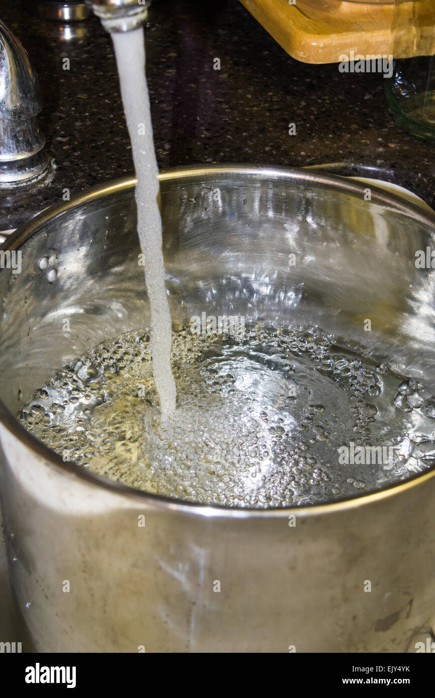 Filling a pot with tap water Stock Photo 80501895 Alamy