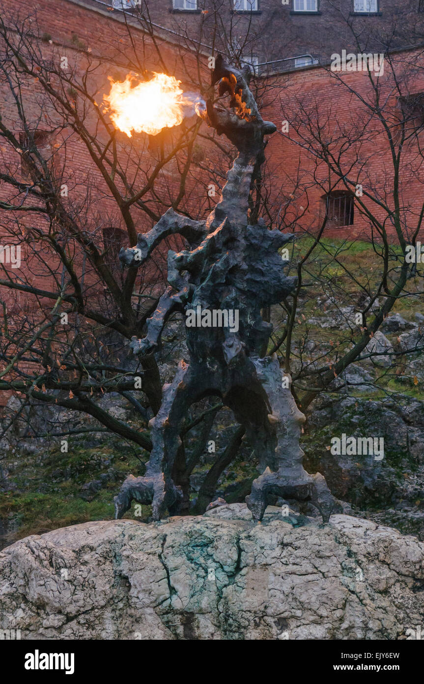 Fire breathing dragon statue in Krakow, Poland. Stock Photo