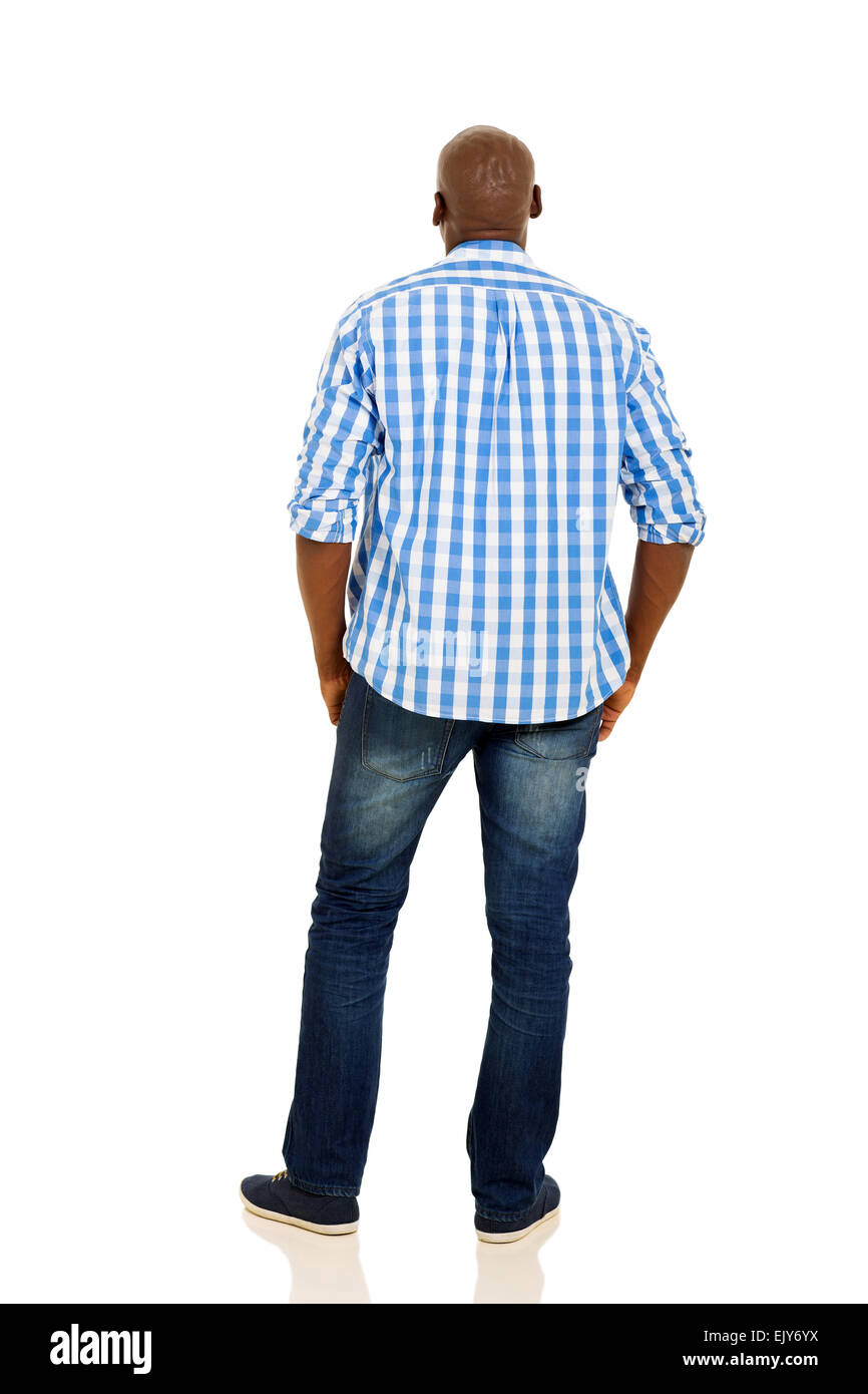Man in Blue and White Plaid Shirt and Denim Jeans Standing on