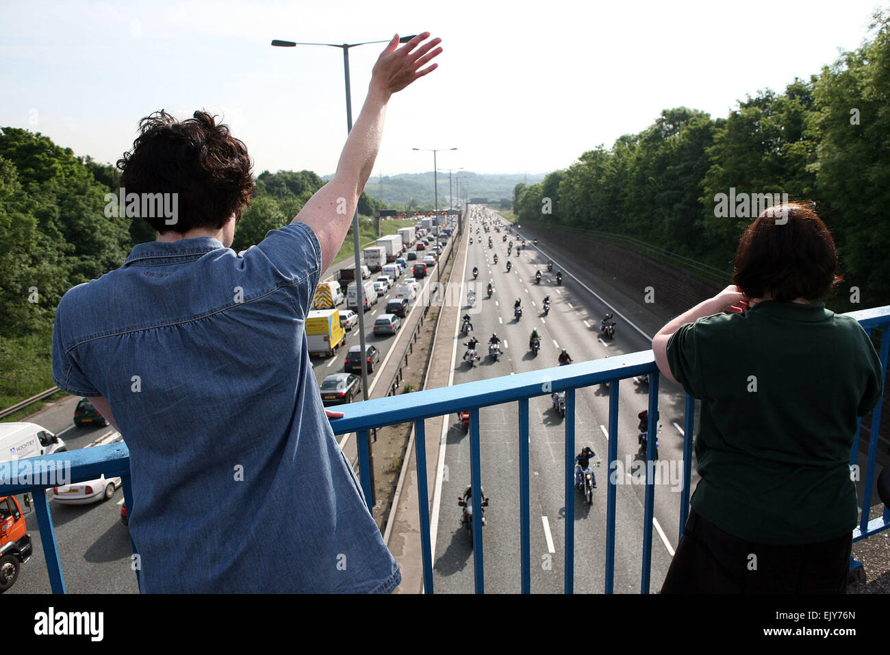 Bikers travel along the M60 at Junction 16 on a go slow protest against fuel prices. Stock Photo