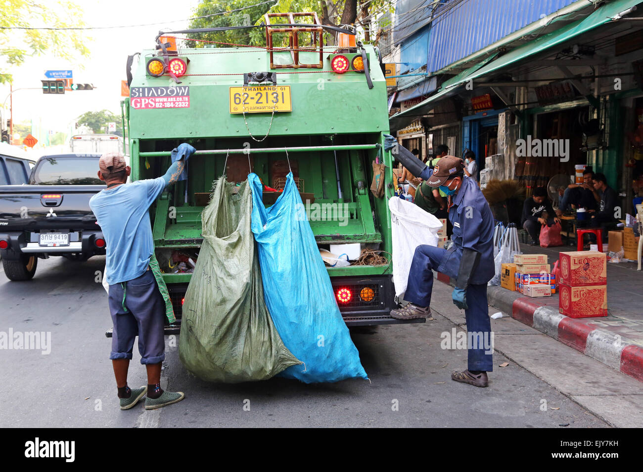 Dustbin men collecting garbage and rubbish the street in Bangkok
