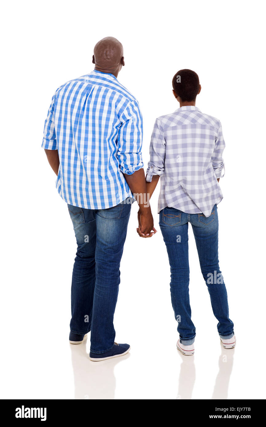 rear view of young African couple holding hands isolated on white ...