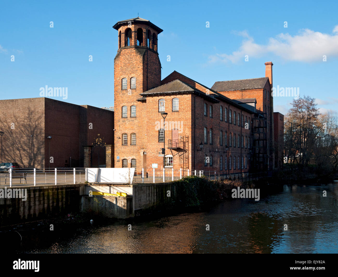 Derby Silk Mill (Lombe's Mill, 1721) and the river Derwent, Cathedral Green, Derby, England, UK Stock Photo