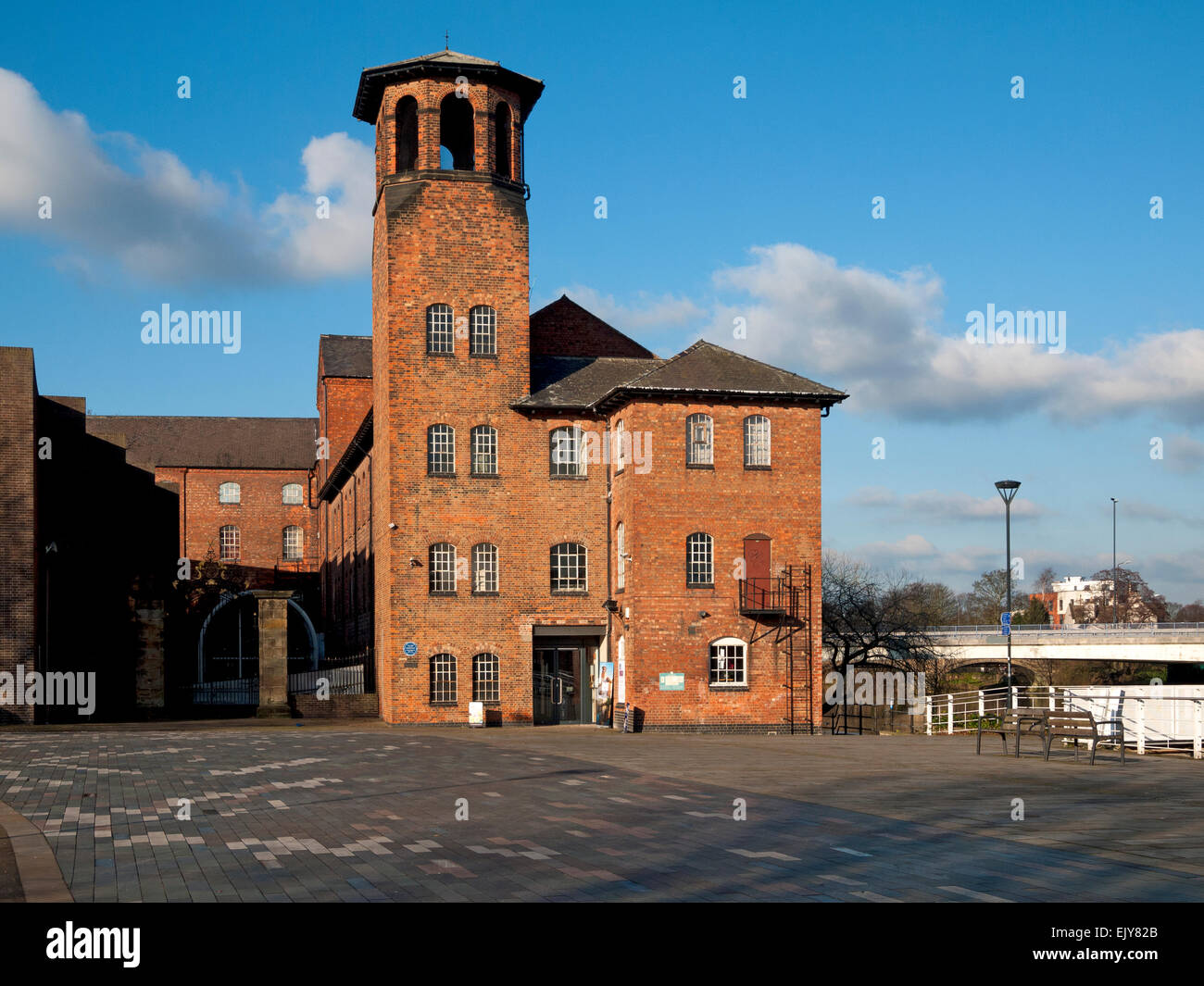 Derby Silk Mill (Lombe's Mill, 1721) by the river Derwent, Cathedral Green, Derby, England, UK Stock Photo