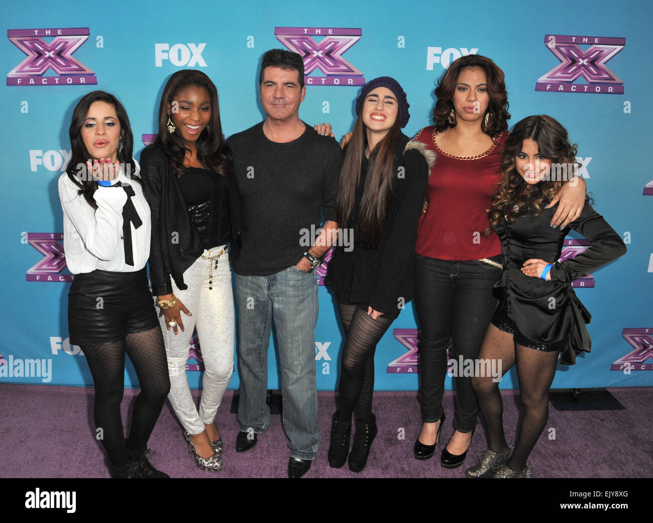 LOS ANGELES, CA DECEMBER 17, 2012 Simon Cowell & Fifth Harmony at the press conference for