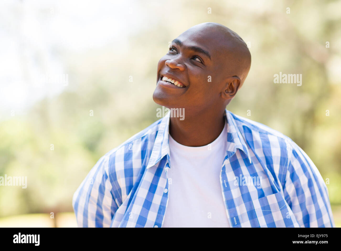 African man plaid shirt hi-res stock photography and images - Alamy