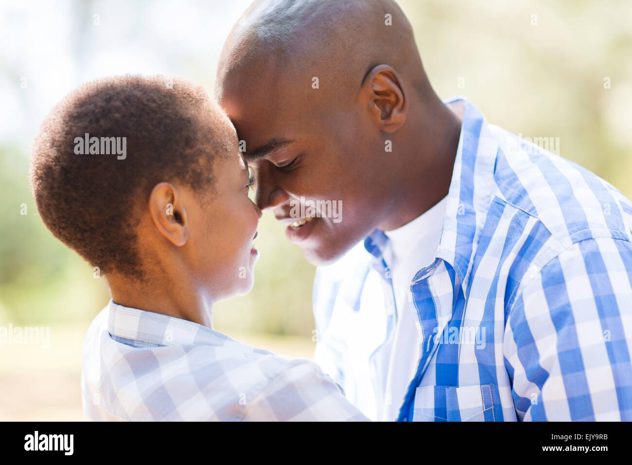 intimate African American couple flirting outdoors Stock Photo - Alamy