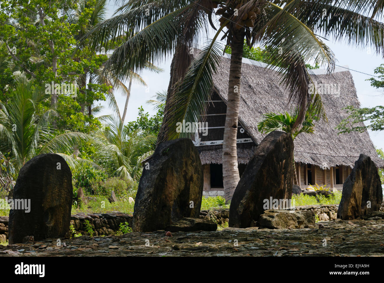 Men's house and stone money, Yap Island, Federated States of Micronesia Stock Photo