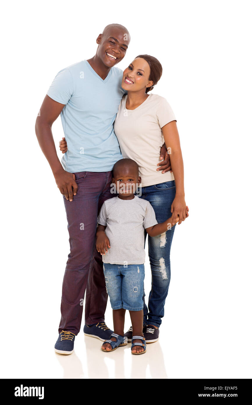 cute young African couple standing with their son isolated on white ...