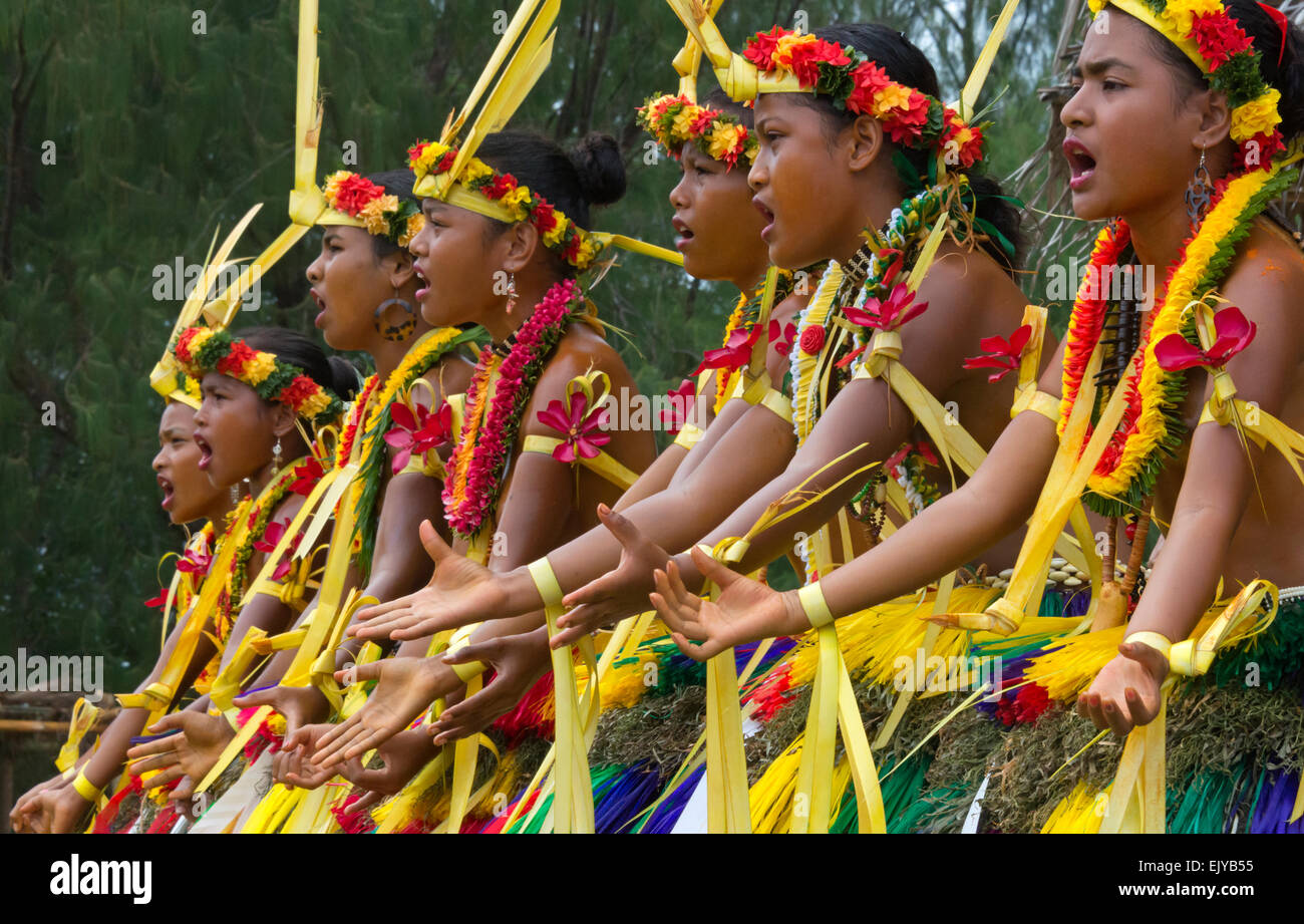Yapese girls in traditional clothing singing and dancing at Yap Day