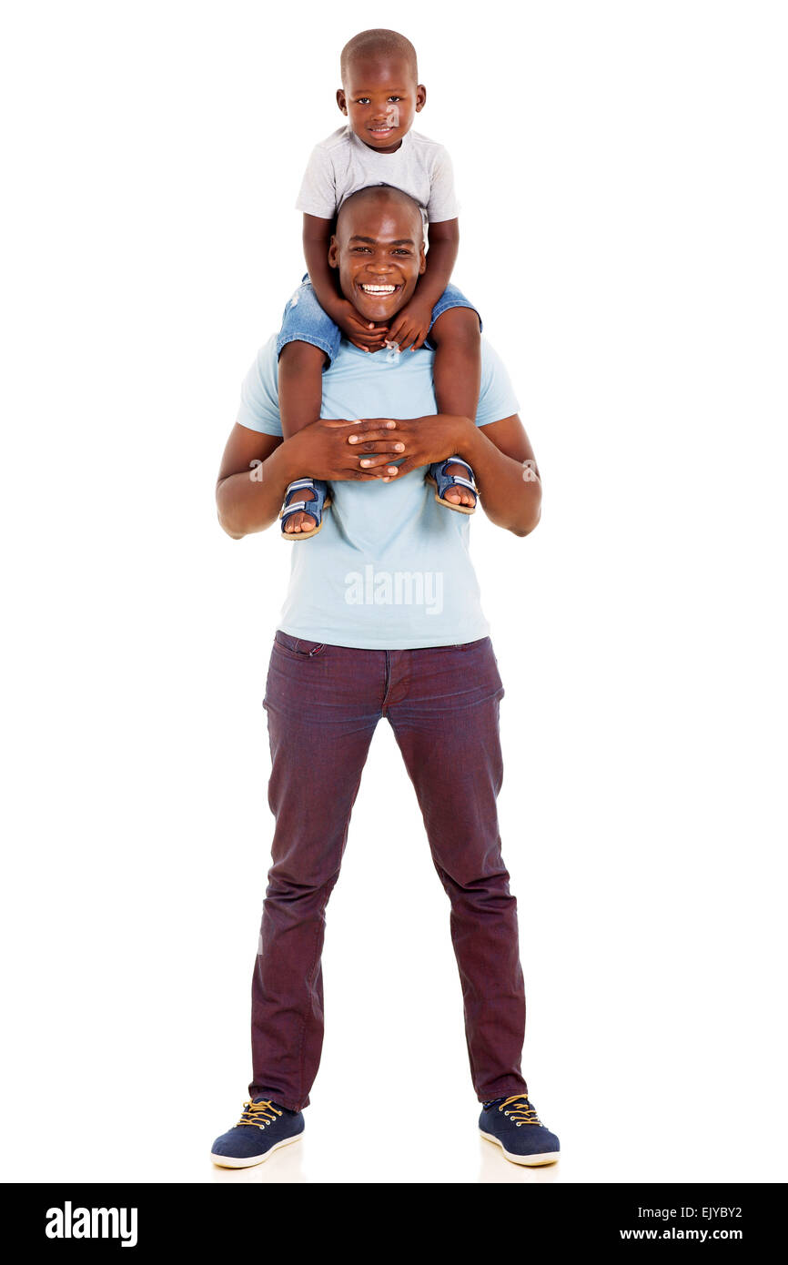 Young boy sitting on fathers shoulders Cut Out Stock Images & Pictures