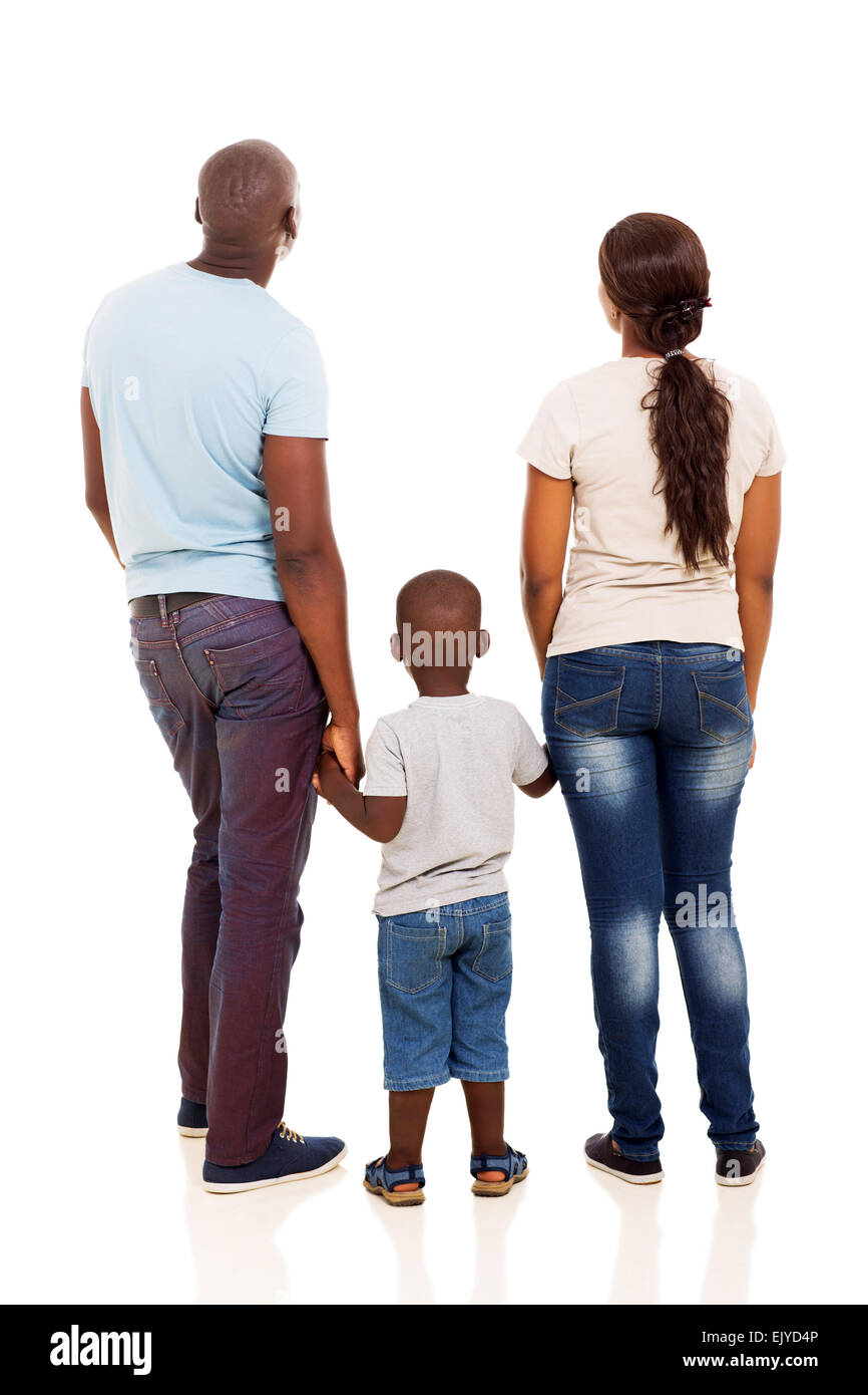 back view of young African family holding hands isolated on white Stock Photo