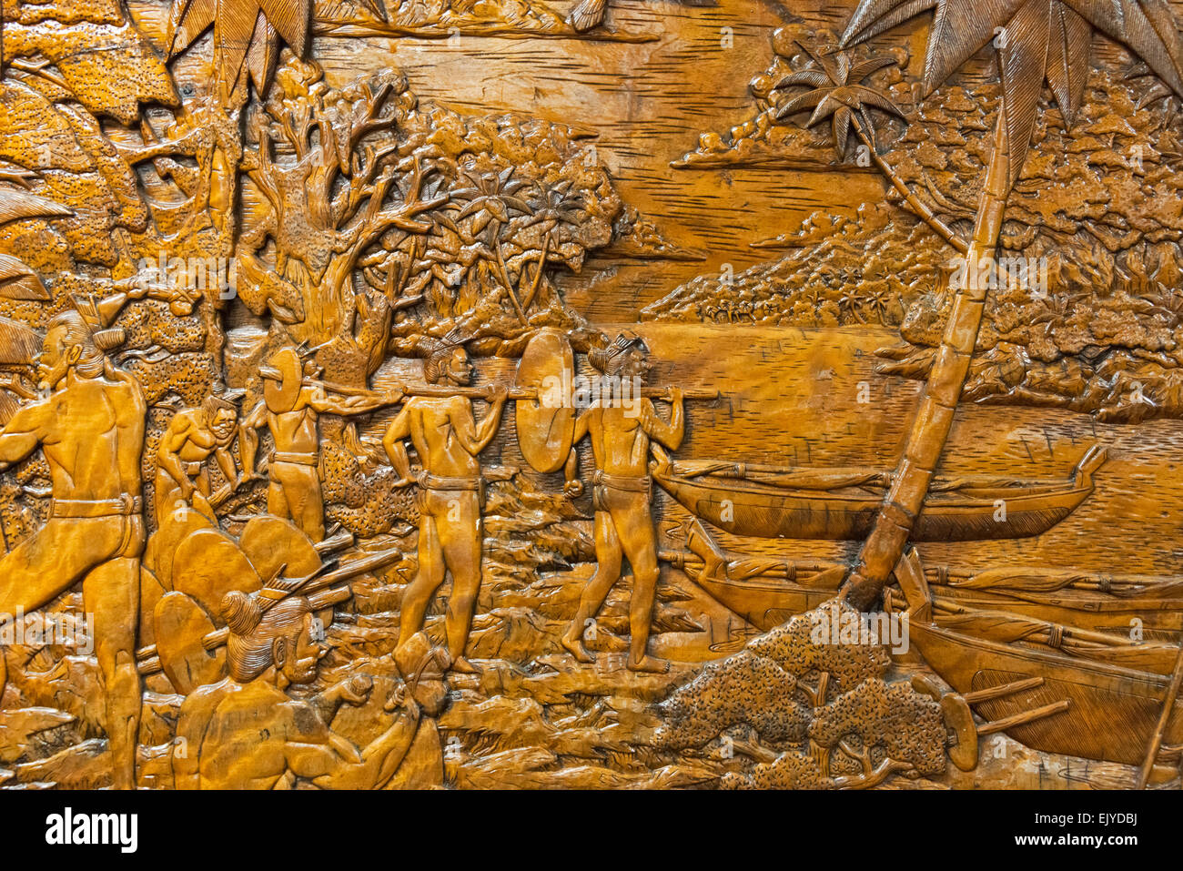 Wood carving depicting local life, Yap Island, Federated States of Micronesia Stock Photo