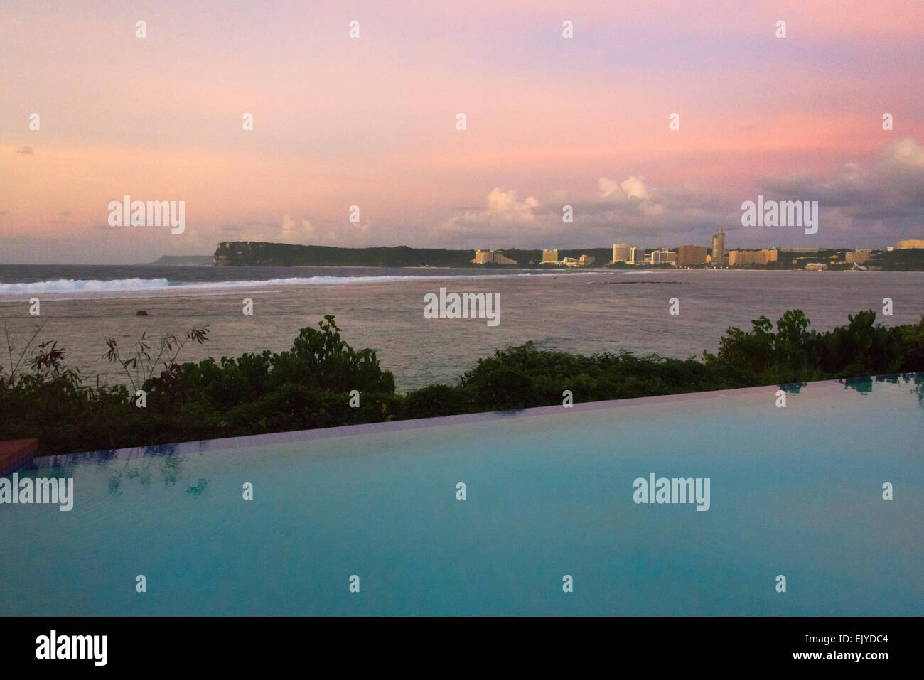 Cityscape of Guam and Two Lovers Point at sunset, Guam, USA Stock Photo