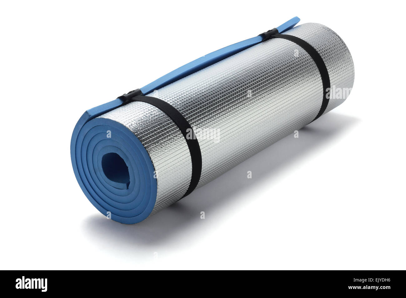 Rolled Up Foam Mat Lying On White Background Stock Photo