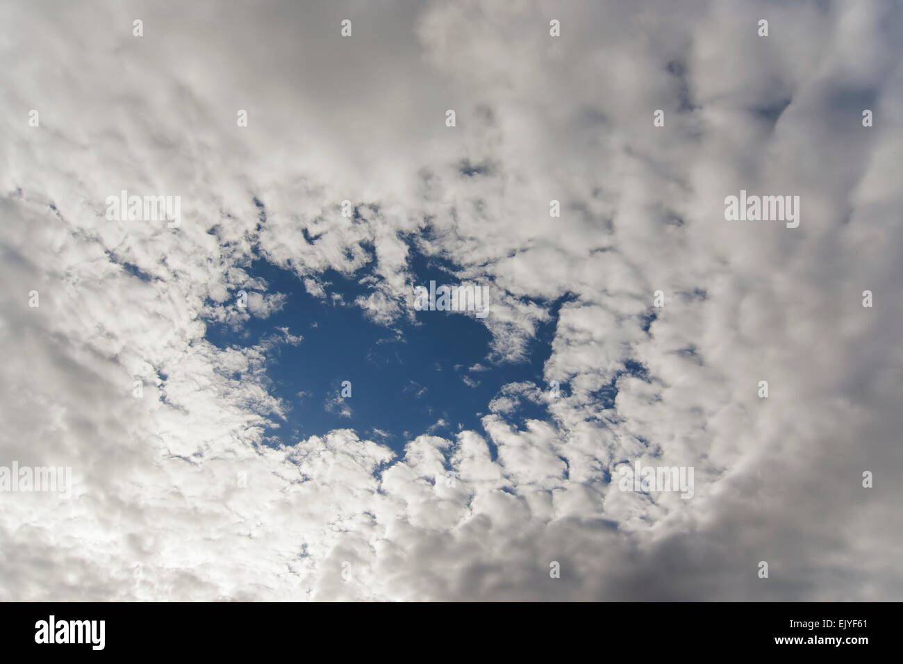 hole in the clouds Stock Photo Alamy