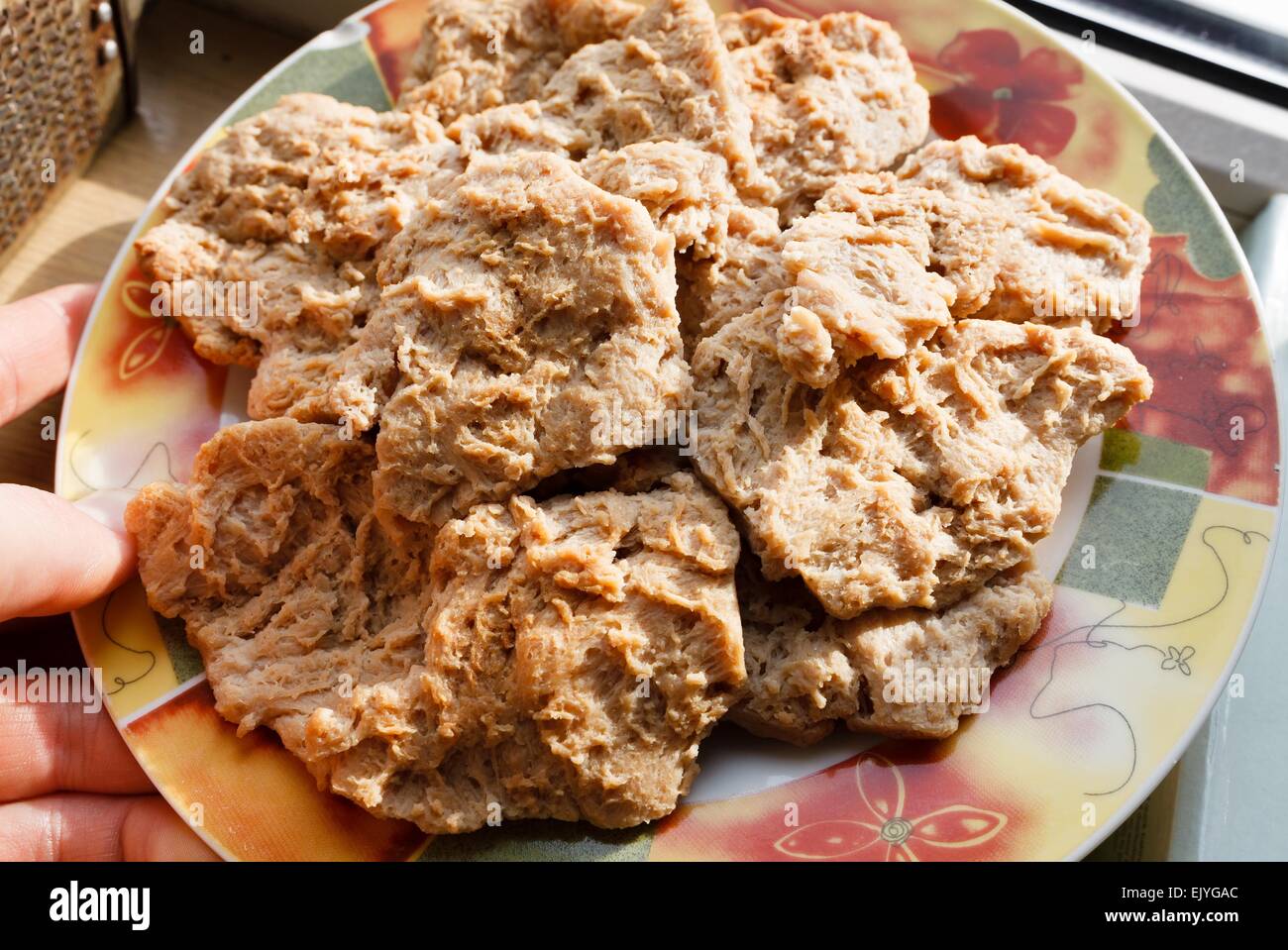 Raw soy meat vegan and vegetarian chop cutlet on colorful plate Stock