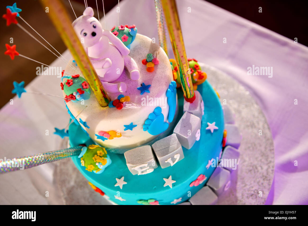 Christening cake with pink teddy bear Stock Photo Alamy