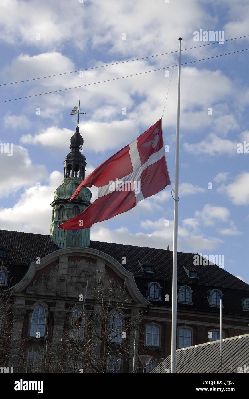Francis Dean. 03rd Apr, 2015. Danish flag (Dannebrog) at half mast/half staff at all official buildings like Parliament, Copenhagen City Hall and all ministries and non public buildings like banks and other non official buildings to mark Good Friday. Danes take very seriously all religious holidays. Denmark is a secular state but the Danish Lutheran church is official state church and Queen Margrethe II of Denmark is head of church  therefore Danish flag is at half mast because of Good Friday. Credit:  Francis Dean/Alamy Live News Stock Photo