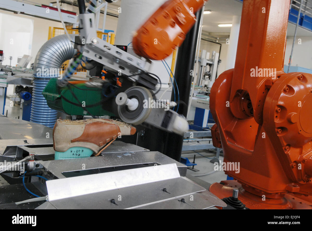 Vigevano (Lombardy, Italy), experimental plant for the production of quality shoes, automatic production with robot Stock Photo