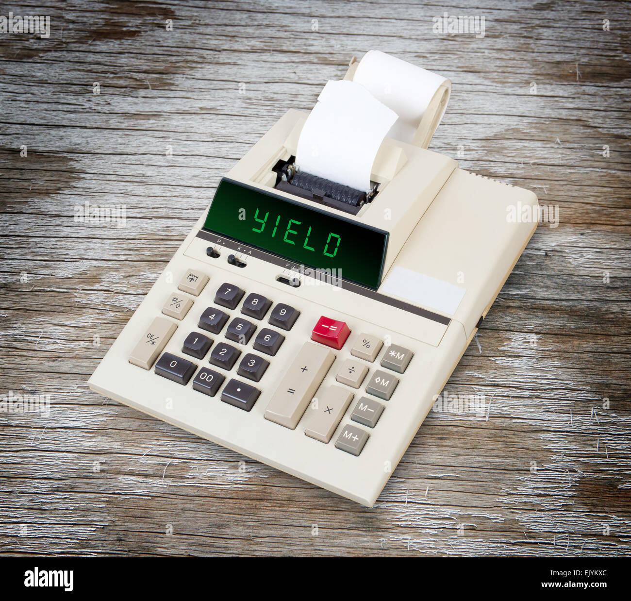 Old calculator showing a text on display - yield Stock Photo