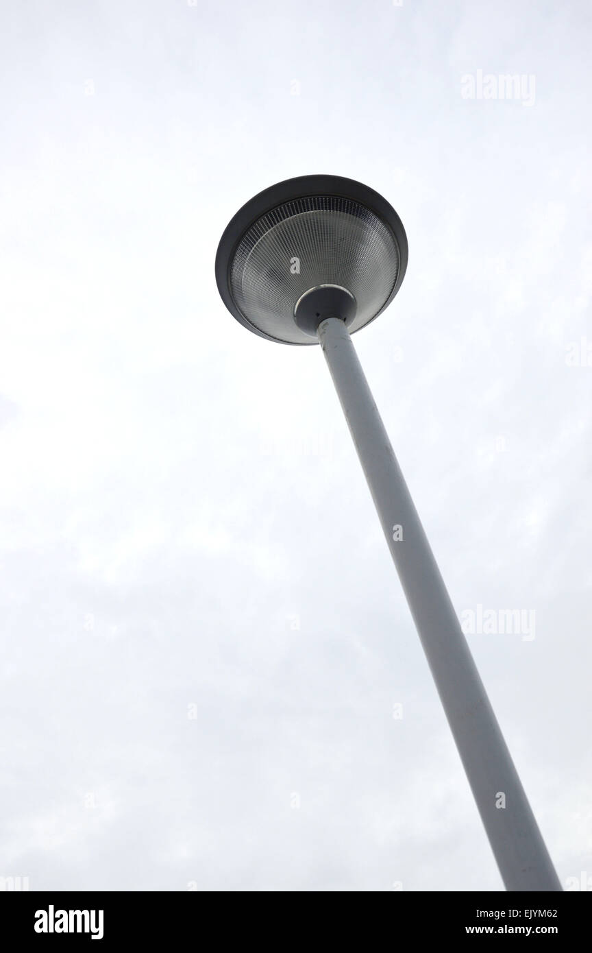 park light poles with white clouds and blue sky backgrounds Stock Photo