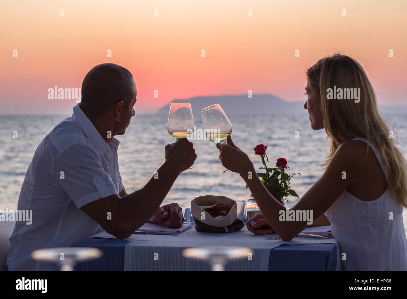 Silhouette Couple Drinking Wine Sunset Stock Photos & Silhouette Couple ...
