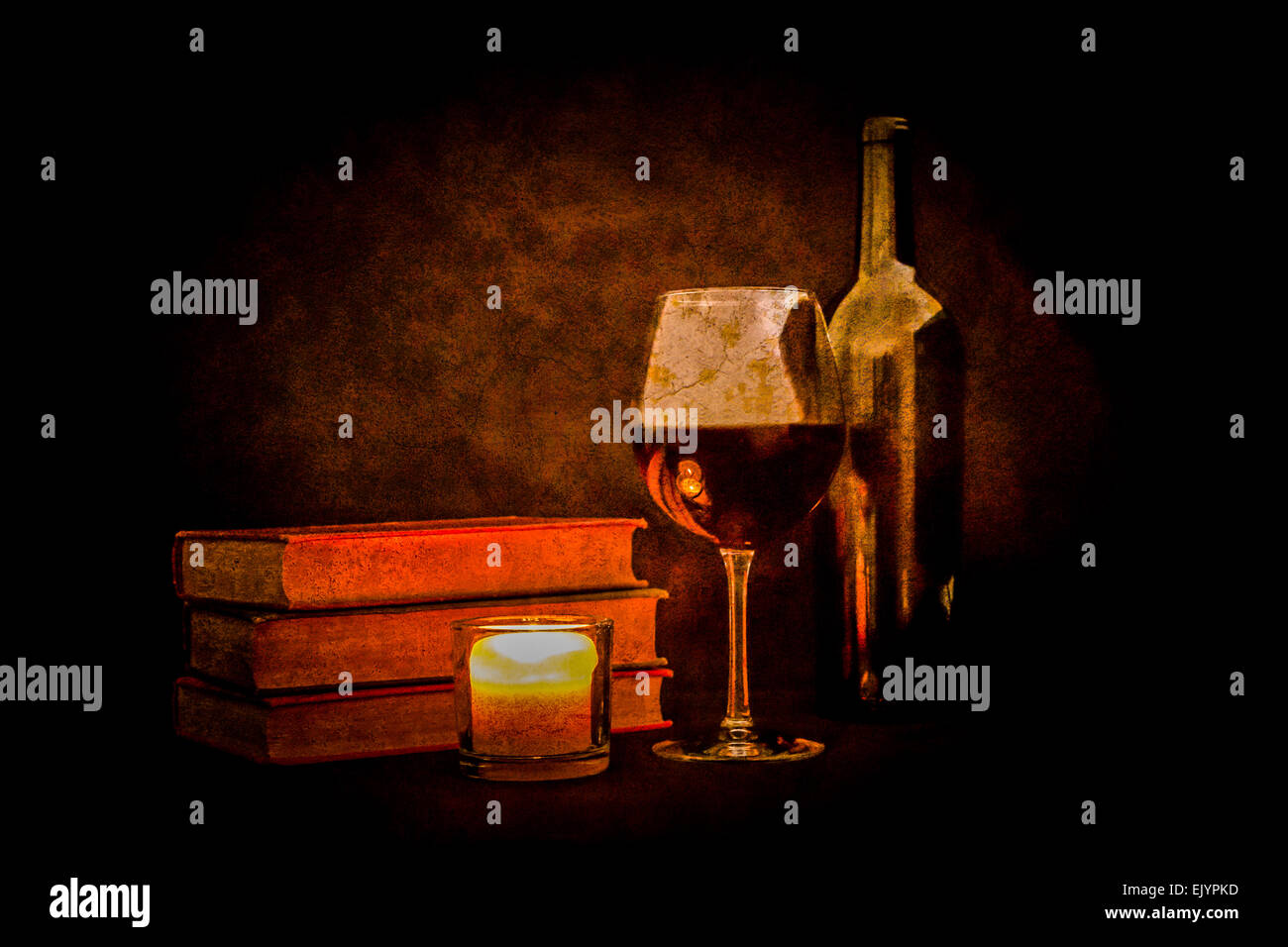 A glass of red wine sits beside a wine bottle, pile of books, and lit