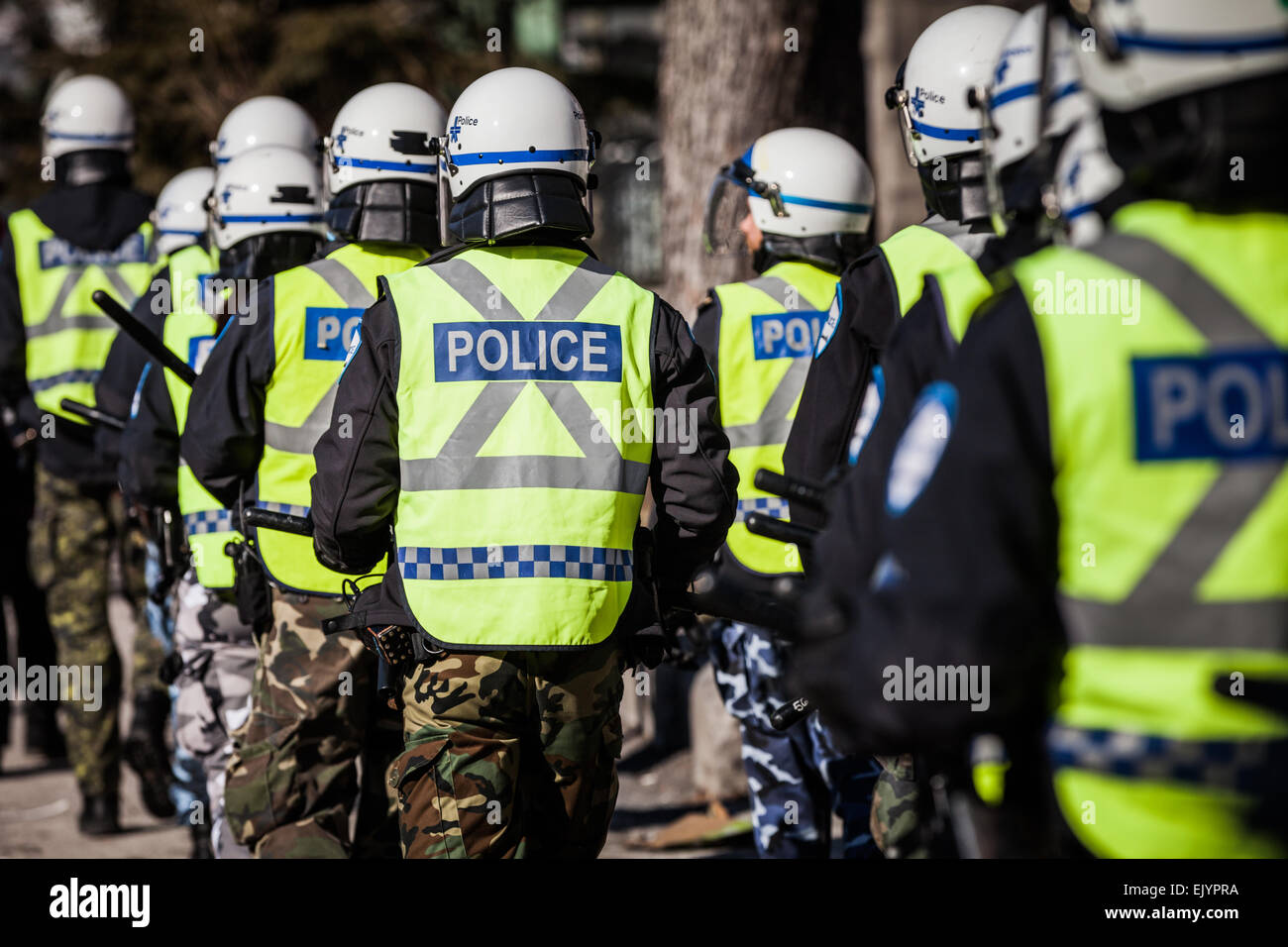 MONTREAL, CANADA, APRIL 02 2015. Riot in the Montreal Streets to counter the Economic Austerity Measures. Closeup of Police Gear Stock Photo