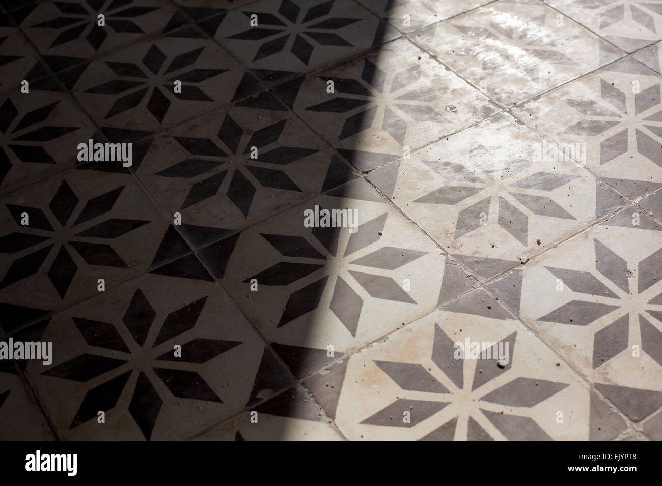 Patterned Ceramic Floor Tiles Catch The Sunlight At Wat
