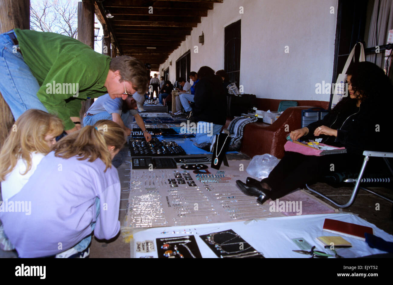 Visitors shop for Indian jewelry in Old Town, Albuquerque, New Mexico