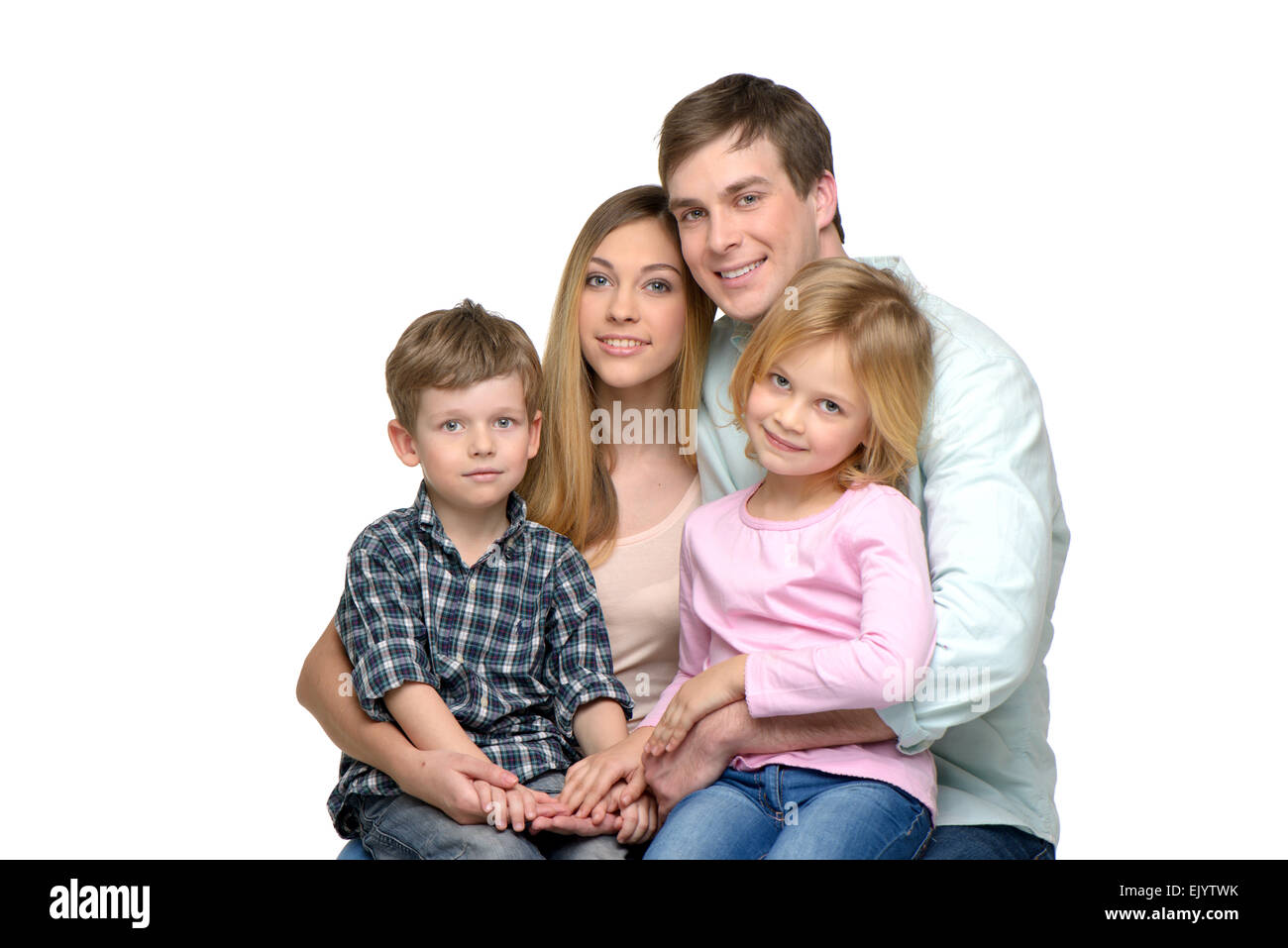 Young family of four hi-res stock photography and images - Alamy