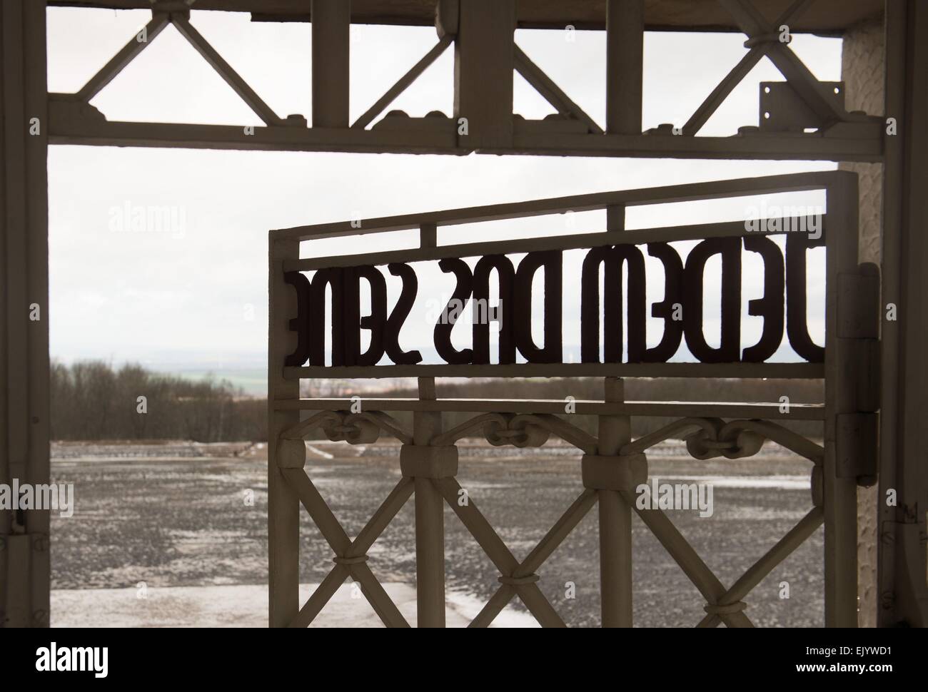 Weimar, Germany. 1st Apr, 2015. A view of the gates at the Buchenwald former concentration camp with the inscription 'Jedem das Seine' near Weimar, Germany, 1 April 2015. 2015 marks the 70th anniversary of the libaration of the Buchenwald and Mittelbau-Dora concentration camps. Photo: Sebastian Kahnert/dpa/Alamy Live News Stock Photo