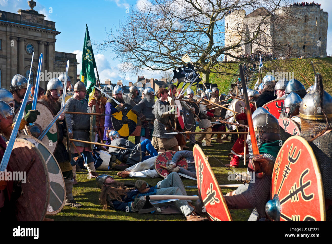Vikings and Anglo Saxons in combat at Cliffords Tower during the Annual Viking Festival York North Yorkshire England UK United Kingdom Great Britain Stock Photo
