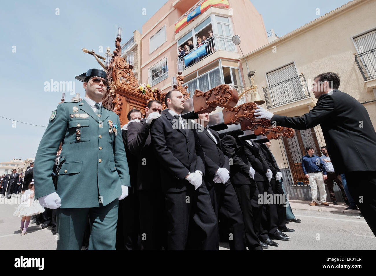 Albox, Almeria, Andalucia, Spain. 3 April, 2015: The Good Friday procession takes place in Albox, Andalucia. In line with other towns in Andalucia, Albox celebrates Easter with a number of religious processions. Penitents cover their heads and dress in traditional costumes to lead a procession of religious floats, called 'pasos' through the streets to the town centre. Credit:  Tom Corban/Alamy Live News Stock Photo