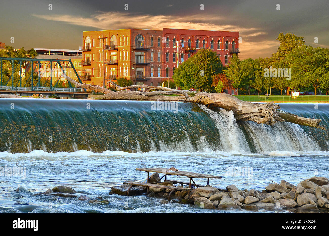 Log on a dam in Grand Rapids, Michigan Stock Photo