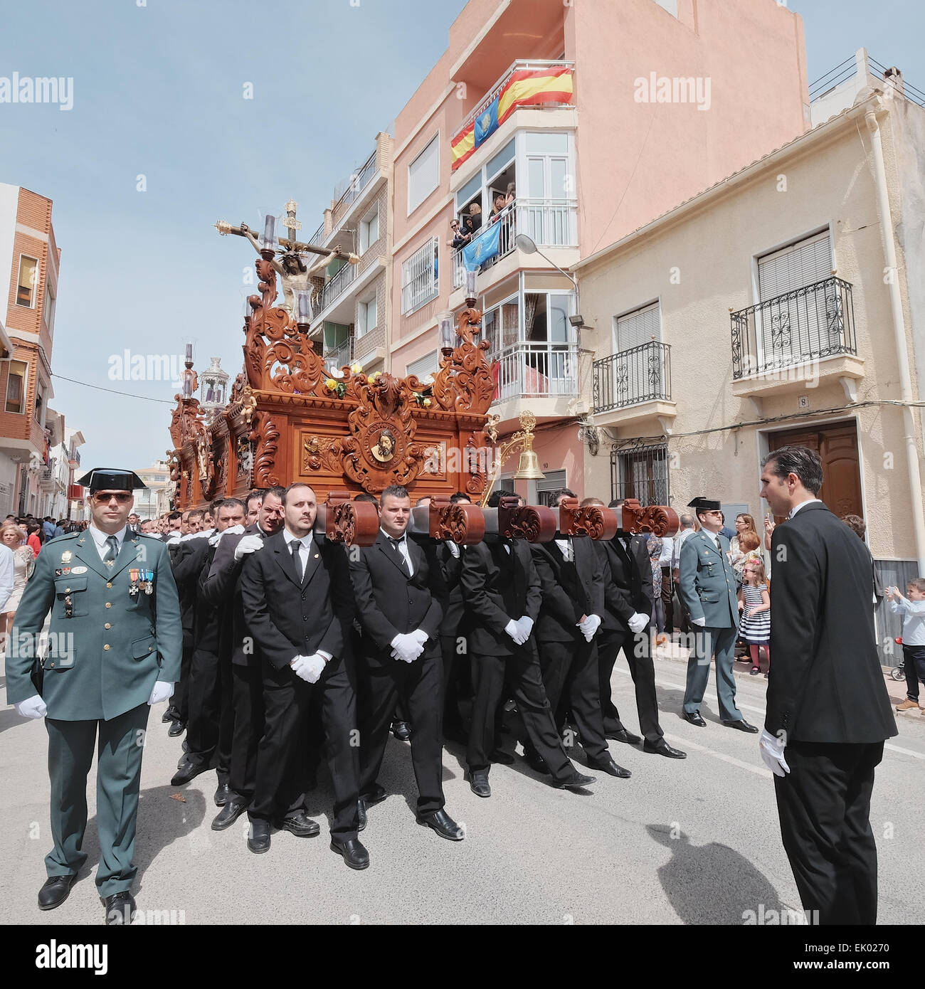 Albox, Almeria, Andalucia, Spain. 3 April, 2015: The Good Friday procession takes place in Albox, Andalucia. In line with other towns in Andalucia, Albox celebrates Easter with a number of religious processions. Penitents cover their heads and dress in traditional costumes to lead a procession of religious floats, called 'pasos' through the streets to the town centre. Credit:  Tom Corban/Alamy Live News Stock Photo