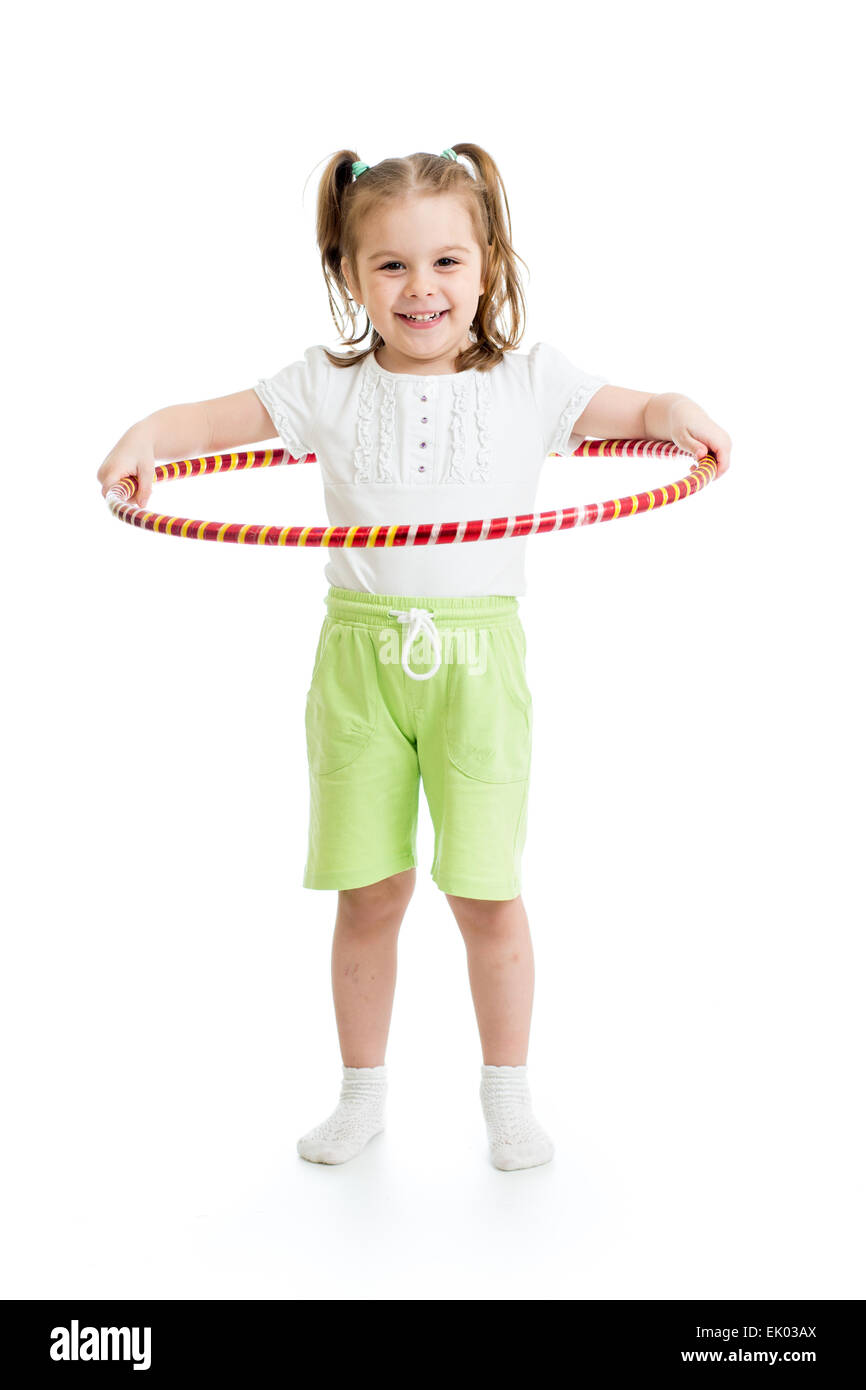 kid girl does gymnastic with hoop on white background Stock Photo