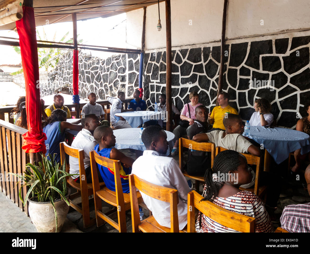Congolese people sitting in a restaurant, Goma, North Kivu province, Democratic Republic of Congo, ( DRC ), Africa Stock Photo