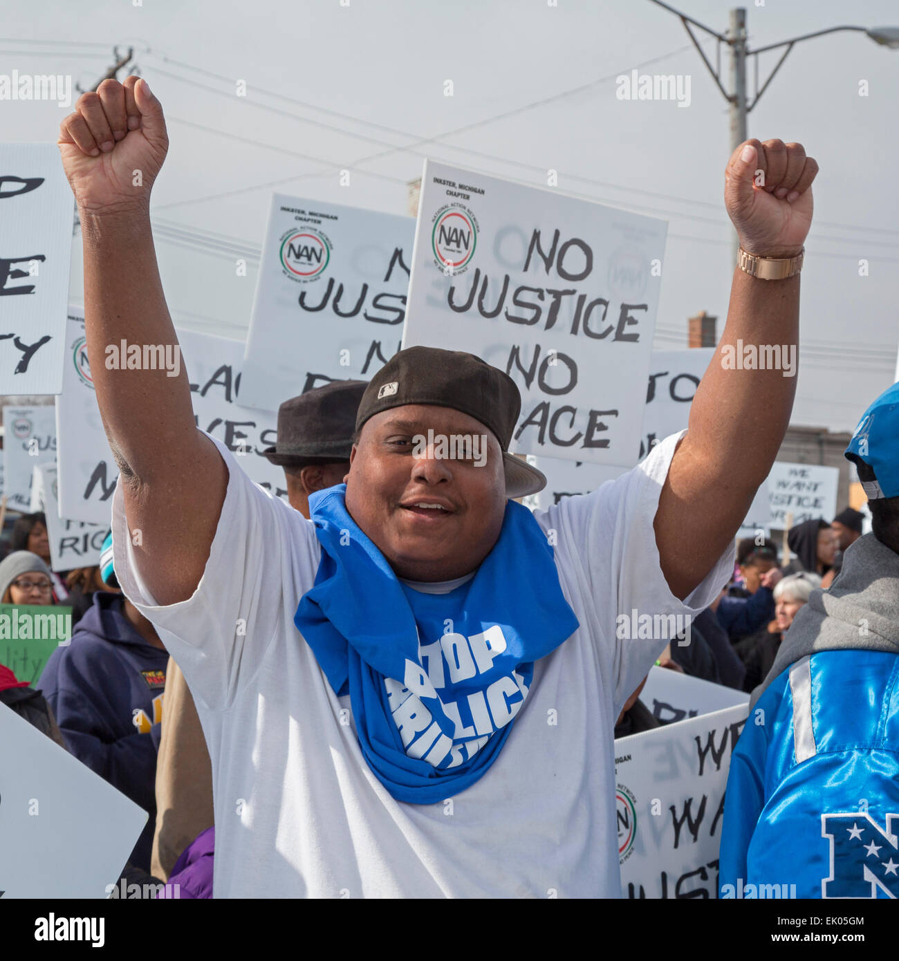 Inkster, Michigan USA. 3 April 2015. Hundreds marched to protest the beating of Floyd Dent, an